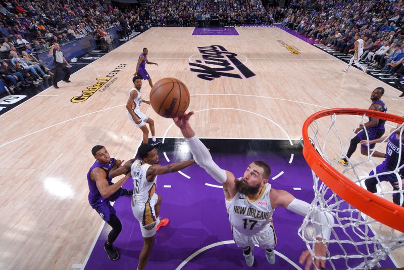 SACRAMENTO, CA - JANUARY 7:  Jonas Valanciunas #17 of the New Orleans Pelicans grabs the rebound during the game on January 7, 2024 at Golden 1 Center in Sacramento, California. NOTE TO USER: User expressly acknowledges and agrees that, by downloading and or using this Photograph, user is consenting to the terms and conditions of the Getty Images License Agreement. Mandatory Copyright Notice: Copyright 2024 NBAE (Photo by Rocky Widner/NBAE via Getty Images)