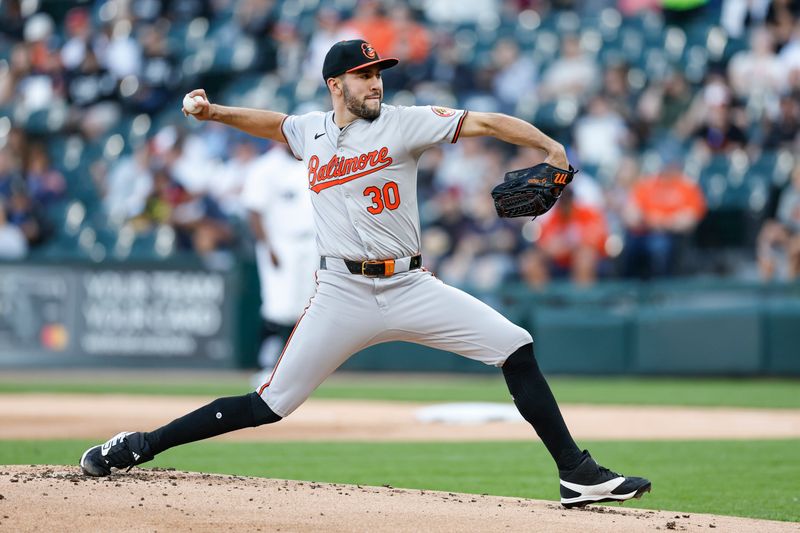 May 23, 2024; Chicago, Illinois, USA; Baltimore Orioles starting pitcher Grayson Rodriguez (30) delivers a pitch against the Chicago White Sox during the first inning at Guaranteed Rate Field. Mandatory Credit: Kamil Krzaczynski-USA TODAY Sports