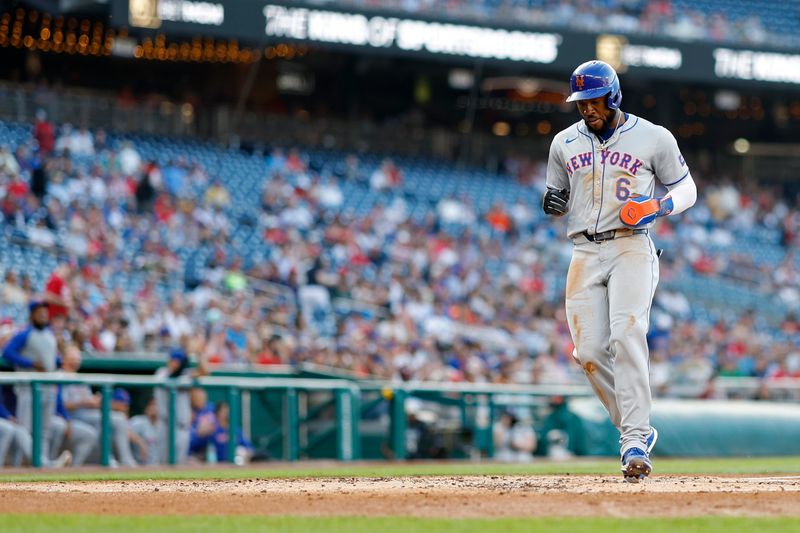 Jun 3, 2024; Washington, District of Columbia, USA; New York Mets outfielder Starling Marte (6) scores a run on a sacrifice fly by Mets outfielder Harrison Bader (not pictured) against the Washington Nationals during the second inning at Nationals Park. Mandatory Credit: Geoff Burke-USA TODAY Sports