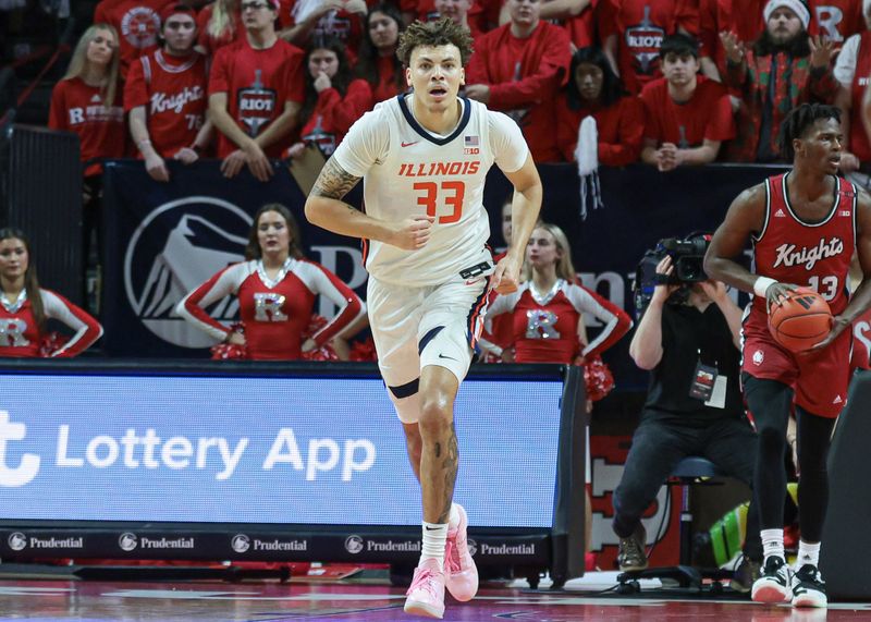 Dec 2, 2023; Piscataway, New Jersey, USA; Illinois Fighting Illini forward Coleman Hawkins (33) runs up court after a basket against the Rutgers Scarlet Knights during the second half at Jersey Mike's Arena. Mandatory Credit: Vincent Carchietta-USA TODAY Sports