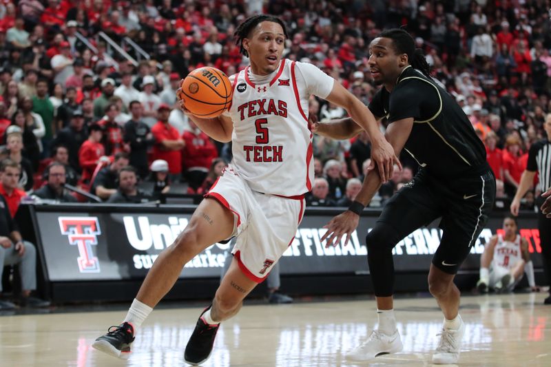 Feb 10, 2024; Lubbock, Texas, USA;  Texas Tech Red Raiders guard Darrion Williams (5) dribbles the ball around Central Florida Knights guard Shemarri Allen (2) in the second half at United Supermarkets Arena. Mandatory Credit: Michael C. Johnson-USA TODAY Sports