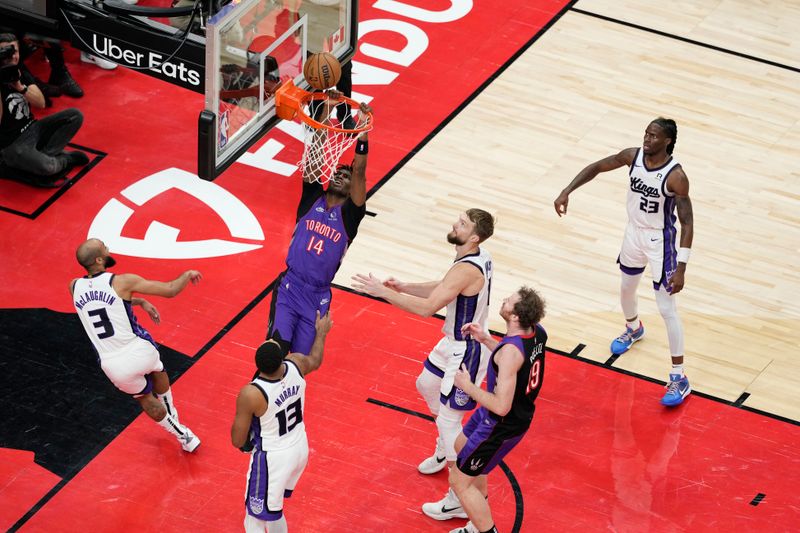 TORONTO, CANADA - NOVEMBER 2: Ja'Kobe Walter #14 of the Toronto Raptors drives to the basket during the game against the Sacramento Kings on November 2, 2024 at the Scotiabank Arena in Toronto, Ontario, Canada.  NOTE TO USER: User expressly acknowledges and agrees that, by downloading and or using this Photograph, user is consenting to the terms and conditions of the Getty Images License Agreement.  Mandatory Copyright Notice: Copyright 2024 NBAE (Photo by Andrew Lahodynskyj/NBAE via Getty Images)