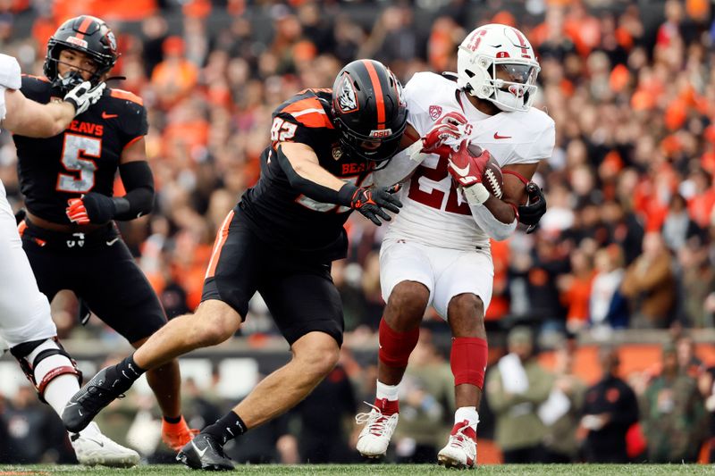 Nov 11, 2023; Corvallis, Oregon, USA; Oregon State Beavers linebacker Cory Stover (82) sacks Stanford Cardinal running back E.J. Smith (22) during the first half at Reser Stadium. Mandatory Credit: Soobum Im-USA TODAY Sports