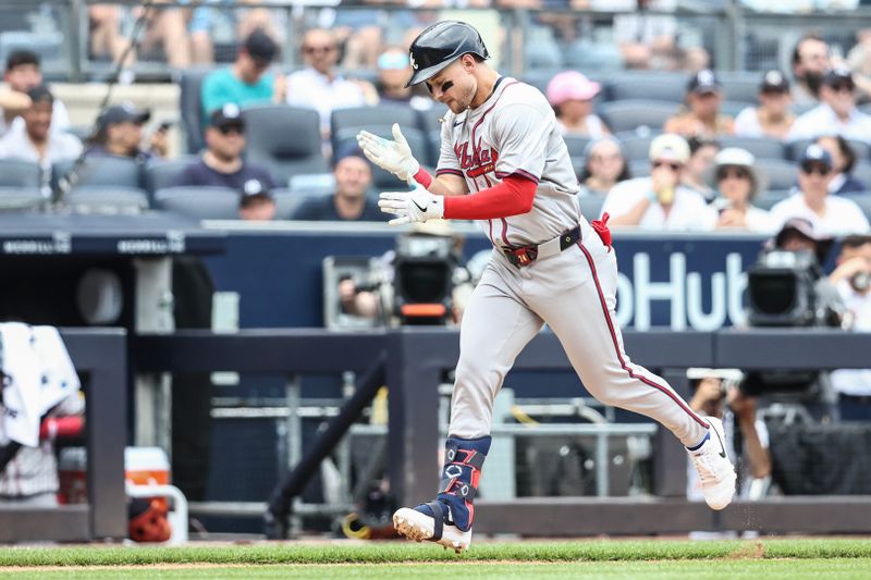 Jun 23, 2024; Bronx, New York, USA;  Atlanta Braves center fielder Jarred Kelenic (24) celebrates after hitting a solo home run in the third inning against the New York Yankees at Yankee Stadium. Mandatory Credit: Wendell Cruz-USA TODAY Sports