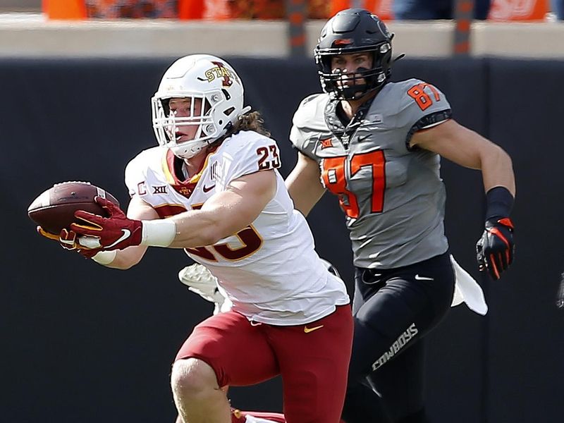 Oct 24, 2020; Stillwater, Oklahoma, USA;  Iowa State Cyclones linebacker Mike Rose (23) catches a deflected pass for an interception against the Oklahoma State Cowboys at Boone Pickens Stadium. Mandatory Credit: Sarah Phipps-USA TODAY Sports