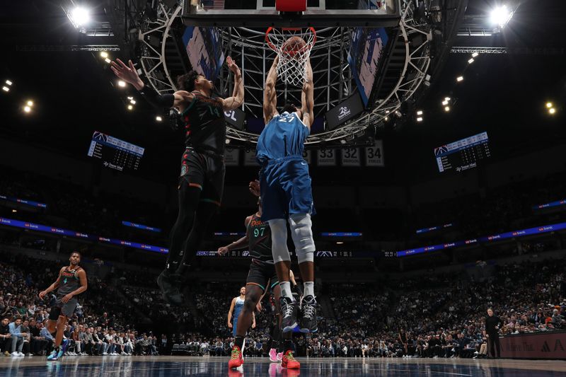 MINNEAPOLIS, MN -  APRIL 9: Rudy Gobert #27 of the Minnesota Timberwolves dunks the ball during the game against the Washington Wizards on April 9, 2024 at Target Center in Minneapolis, Minnesota. NOTE TO USER: User expressly acknowledges and agrees that, by downloading and or using this Photograph, user is consenting to the terms and conditions of the Getty Images License Agreement. Mandatory Copyright Notice: Copyright 2024 NBAE (Photo by Jordan Johnson/NBAE via Getty Images)