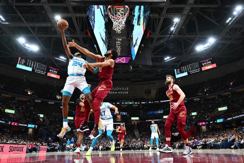 CLEVELAND, OHIO - JANUARY 05: Brandon Miller #24 of the Charlotte Hornets shoots over Jarrett Allen #31 of the Cleveland Cavaliers during the third quarter at Rocket Mortgage Fieldhouse on January 05, 2025 in Cleveland, Ohio. The Cavaliers defeated the Hornets 115-105. NOTE TO USER: User expressly acknowledges and agrees that, by downloading and or using this photograph, User is consenting to the terms and conditions of the Getty Images License Agreement. (Photo by Jason Miller/Getty Images)