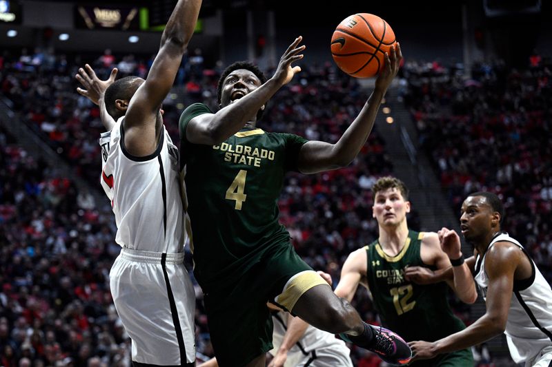 Feb 13, 2024; San Diego, California, USA; Colorado State Rams guard Isaiah Stevens (4) goes to the basket during the second half against the San Diego State Aztecs at Viejas Arena. Mandatory Credit: Orlando Ramirez-USA TODAY Sports