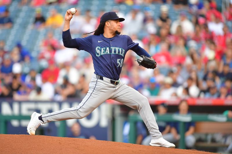 Jul 11, 2024; Anaheim, California, USA; Seattle Mariners pitcher Luis Castillo (58) throws against the Los Angeles Angels during the first inning at Angel Stadium. Mandatory Credit: Gary A. Vasquez-USA TODAY Sports