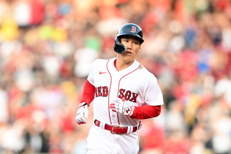 May 31, 2023; Boston, Massachusetts, USA; Boston Red Sox left fielder Masataka Yoshida (7) runs the bases after hitting a solo home run against the Cincinnati Reds during the second inning at Fenway Park. Mandatory Credit: Brian Fluharty-USA TODAY Sports