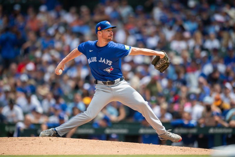 Aug 17, 2024; Chicago, Illinois, USA; Toronto Blue Jays starting pitcher Chris Bassitt (40) pitches during the first inning against the Chicago Cubs at Wrigley Field. Mandatory Credit: Patrick Gorski-USA TODAY Sports