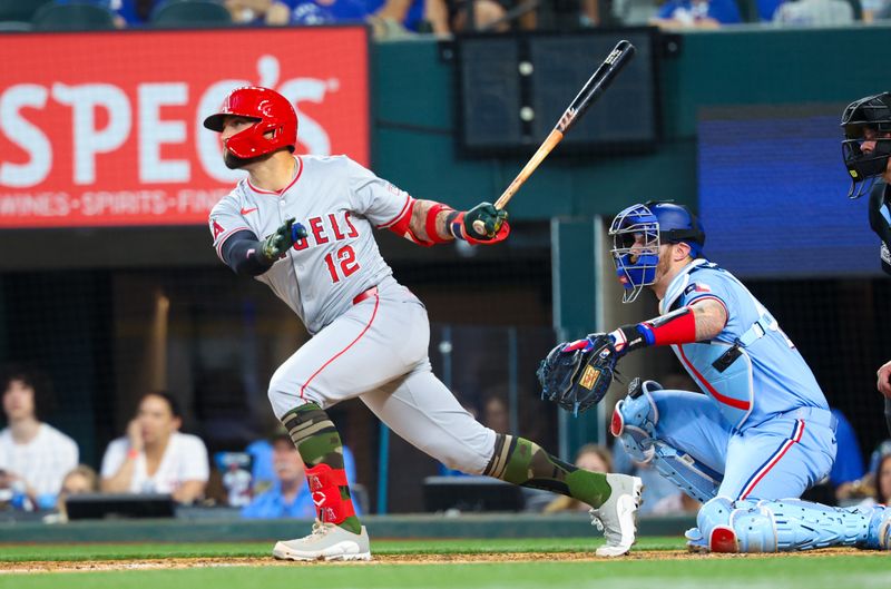 May 19, 2024; Arlington, Texas, USA; Los Angeles Angels outfielder Kevin Pillar (12) hits a two-run single during the seventh inning against the Texas Rangers at Globe Life Field. Mandatory Credit: Kevin Jairaj-USA TODAY Sports