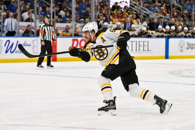 Nov 12, 2024; St. Louis, Missouri, USA;  Boston Bruins right wing David Pastrnak (88) shoots against the St. Louis Blues during the first period at Enterprise Center. Mandatory Credit: Jeff Curry-Imagn Images