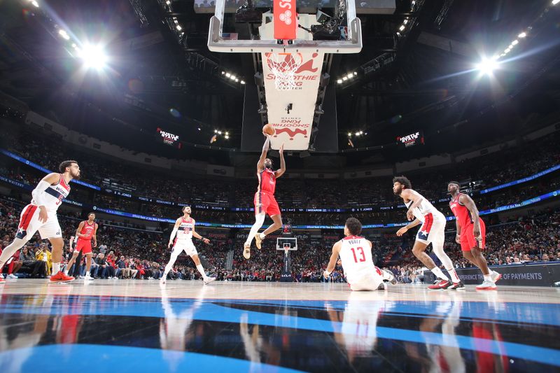 NEW ORLEANS, LA - FEBRUARY 14: Naji Marshall #8 of the New Orleans Pelicans drives to the basket during the game against the Washington Wizards on February 14, 2024 at the Smoothie King Center in New Orleans, Louisiana. NOTE TO USER: User expressly acknowledges and agrees that, by downloading and or using this Photograph, user is consenting to the terms and conditions of the Getty Images License Agreement. Mandatory Copyright Notice: Copyright 2024 NBAE (Photo by Layne Murdoch Jr./NBAE via Getty Images)