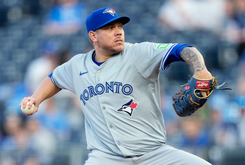 Apr 24, 2024; Kansas City, Missouri, USA; Toronto Blue Jays pitcher Yariel Rodríguez (29) pitches during the first inning against the Kansas City Royals at Kauffman Stadium. Mandatory Credit: Jay Biggerstaff-USA TODAY Sports