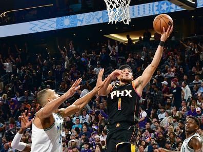 PHOENIX, AZ - NOVEMBER 15: Devin Booker #1 of the Phoenix Suns drives to the basket during the game against the Minnesota Timberwolves on November 15, 2023 at Footprint Center in Phoenix, Arizona. NOTE TO USER: User expressly acknowledges and agrees that, by downloading and or using this photograph, user is consenting to the terms and conditions of the Getty Images License Agreement. Mandatory Copyright Notice: Copyright 2023 NBAE (Photo by Kate Frese/NBAE via Getty Images)