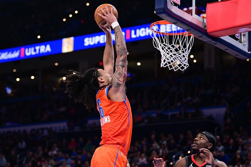 OKLAHOMA CITY, OKLAHOMA - MARCH 27: Jaylin Williams #6 of the Oklahoma City Thunder goes up for a dunk during the second half against the Houston Rockets at Paycom Center on March 27, 2024 in Oklahoma City, Oklahoma. NOTE TO USER: User expressly acknowledges and agrees that, by downloading and or using this Photograph, user is consenting to the terms and conditions of the Getty Images License Agreement. (Photo by Joshua Gateley/Getty Images)