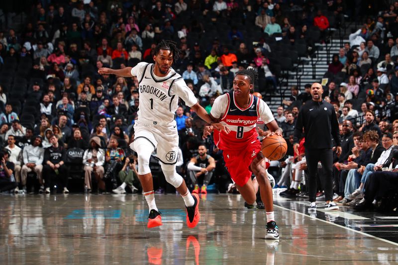 BROOKLYN, NY - OCTOBER 14: Bub Carrington #8 of the Washington Wizards dribbles the ball during the game against the Brooklyn Nets during a NBA preseason game on October 14, 2024 at Barclays Center in Brooklyn, New York. NOTE TO USER: User expressly acknowledges and agrees that, by downloading and or using this Photograph, user is consenting to the terms and conditions of the Getty Images License Agreement. Mandatory Copyright Notice: Copyright 2024 NBAE (Photo by David L. Nemec/NBAE via Getty Images)