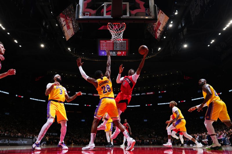 TORONTO, CANADA - NOVEMBER 1: RJ Barrett #9 of the Toronto Raptors drives to the basket during the game against the Los Angeles Lakers on November 1, 2024 at the Scotiabank Arena in Toronto, Ontario, Canada.  NOTE TO USER: User expressly acknowledges and agrees that, by downloading and or using this Photograph, user is consenting to the terms and conditions of the Getty Images License Agreement.  Mandatory Copyright Notice: Copyright 2024 NBAE (Photo by Mark Blinch/NBAE via Getty Images)