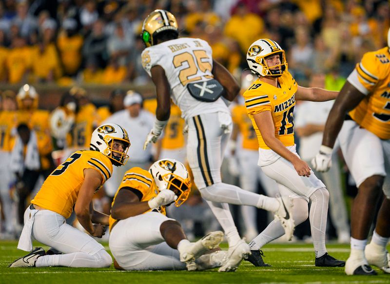 Sep 21, 2024; Columbia, Missouri, USA; Missouri Tigers place kicker Blake Craig (19) watches after kicking a field goal against the Vanderbilt Commodores during overtime at Faurot Field at Memorial Stadium. Mandatory Credit: Jay Biggerstaff-Imagn Images