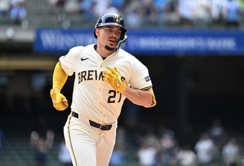 May 1, 2024; Milwaukee, Wisconsin, USA; Milwaukee Brewers shortstop Willy Adames (27) rounds the bases after hitting a home run against the Tampa Bay Rays in the seventh inning at American Family Field. Mandatory Credit: Michael McLoone-USA TODAY Sports