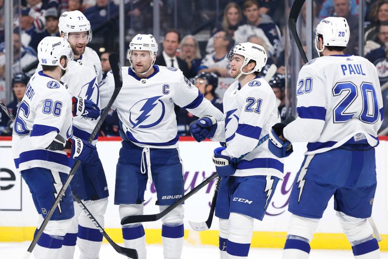 Jan 2, 2024; Winnipeg, Manitoba, CAN; Tampa Bay Lightning center Steven Stamkos (91) celebrates his first period goal against the Winnipeg Jets at Canada Life Centre. Mandatory Credit: James Carey Lauder-USA TODAY Sports