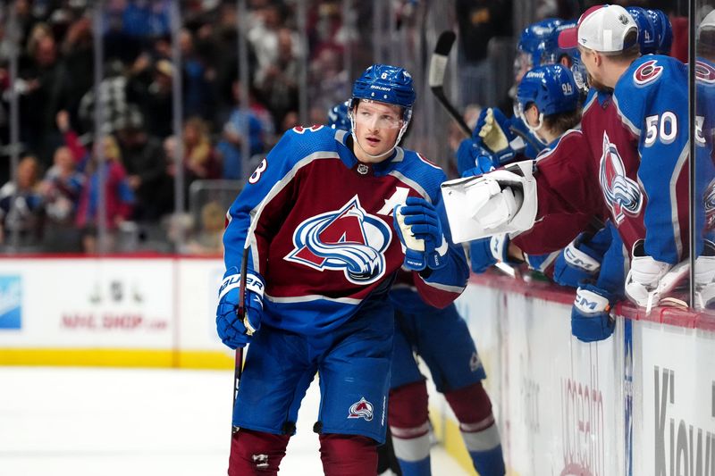 Nov 22, 2023; Denver, Colorado, USA; Colorado Avalanche defenseman Cale Makar (8) celebrates a goal in the third period against the Vancouver Canucks at Ball Arena. Mandatory Credit: Ron Chenoy-USA TODAY Sports