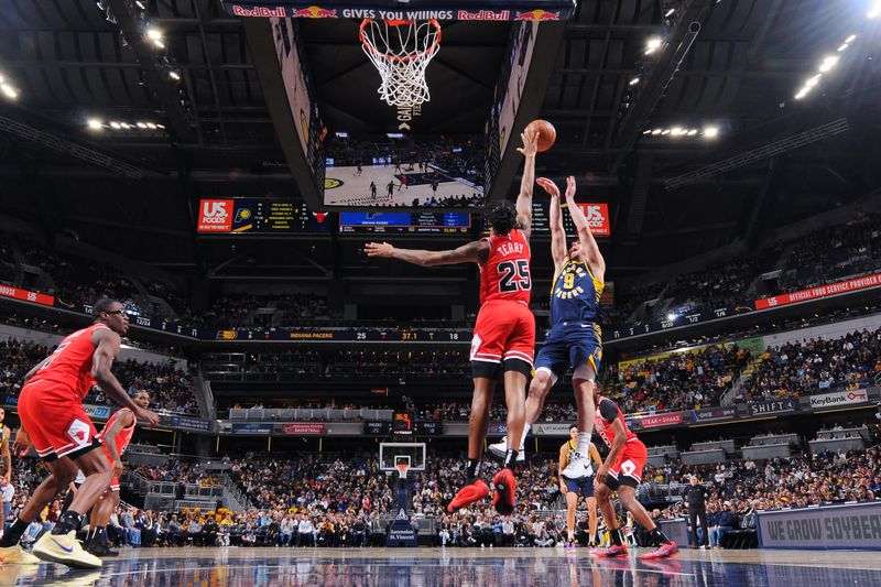 INDIANAPOLIS, IN - JANUARY 8: Dalen Terry #25 of the Chicago Bulls blocks the ball during the game against the Indiana Pacers on January 8, 2025 at Gainbridge Fieldhouse in Indianapolis, Indiana. NOTE TO USER: User expressly acknowledges and agrees that, by downloading and or using this Photograph, user is consenting to the terms and conditions of the Getty Images License Agreement. Mandatory Copyright Notice: Copyright 2025 NBAE (Photo by Ron Hoskins/NBAE via Getty Images)