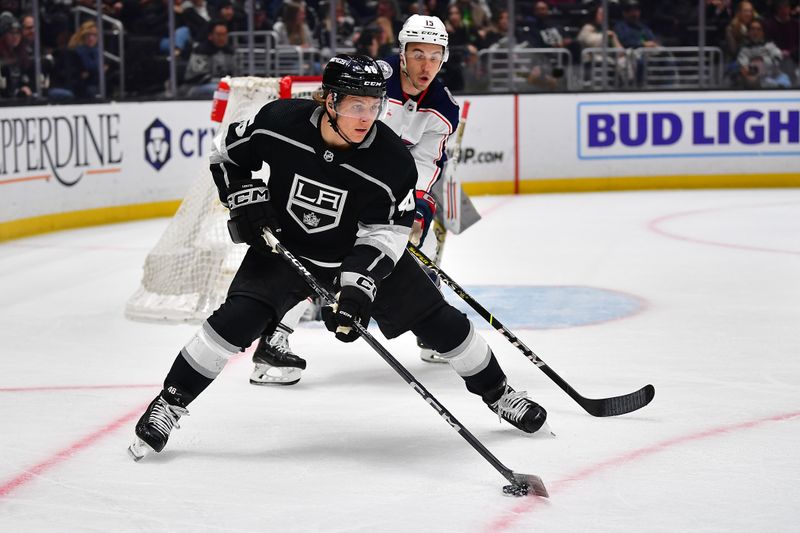 Mar 16, 2023; Los Angeles, California, USA; Los Angeles Kings center Blake Lizotte (46) controls the puck against the Columbus Blue Jackets during the second period at Crypto.com Arena. Mandatory Credit: Gary A. Vasquez-USA TODAY Sports