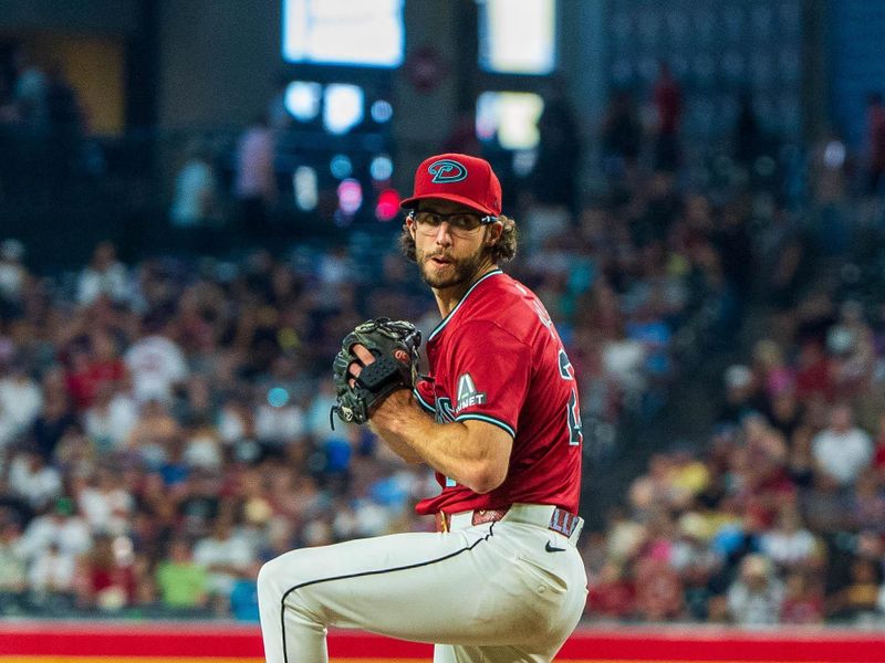 Apr 14, 2024; Phoenix, Arizona, USA; Arizona Diamondbacks starting pitcher Zac Gallen (23) on the mound in the first inning during a game against the St. Louis Cardinals at Chase Field. Mandatory Credit: Allan Henry-USA TODAY Sports