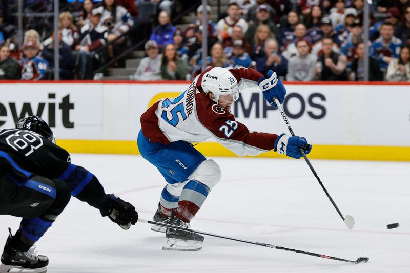 Feb 24, 2024; Denver, Colorado, USA; Colorado Avalanche right wing Logan O'Connor (25) attempts a shot ahead of Toronto Maple Leafs defenseman TJ Brodie (78) in the second period at Ball Arena. Mandatory Credit: Isaiah J. Downing-USA TODAY Sports