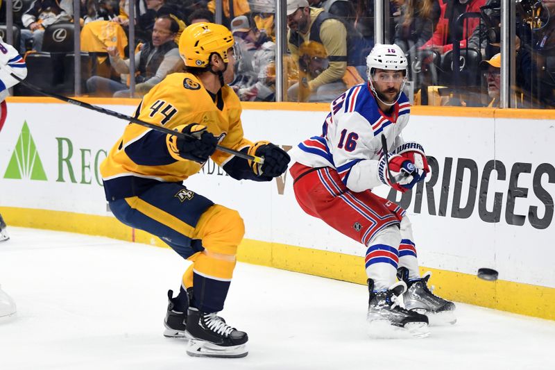 Dec 2, 2023; Nashville, Tennessee, USA; New York Rangers center Vincent Trocheck (16) plays the puck before being hit by Nashville Predators left wing Kiefer Sherwood (44) during the first period at Bridgestone Arena. Mandatory Credit: Christopher Hanewinckel-USA TODAY Sports