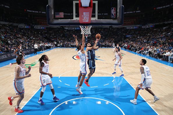 OKLAHOMA CITY, OK - DECEMBER 18: David Roddy #21 of the Memphis Grizzlies shoots the ball during the game against the Oklahoma City Thunder on December 18, 2023 at Paycom Arena in Oklahoma City, Oklahoma. NOTE TO USER: User expressly acknowledges and agrees that, by downloading and or using this photograph, User is consenting to the terms and conditions of the Getty Images License Agreement. Mandatory Copyright Notice: Copyright 2023 NBAE (Photo by Zach Beeker/NBAE via Getty Images)