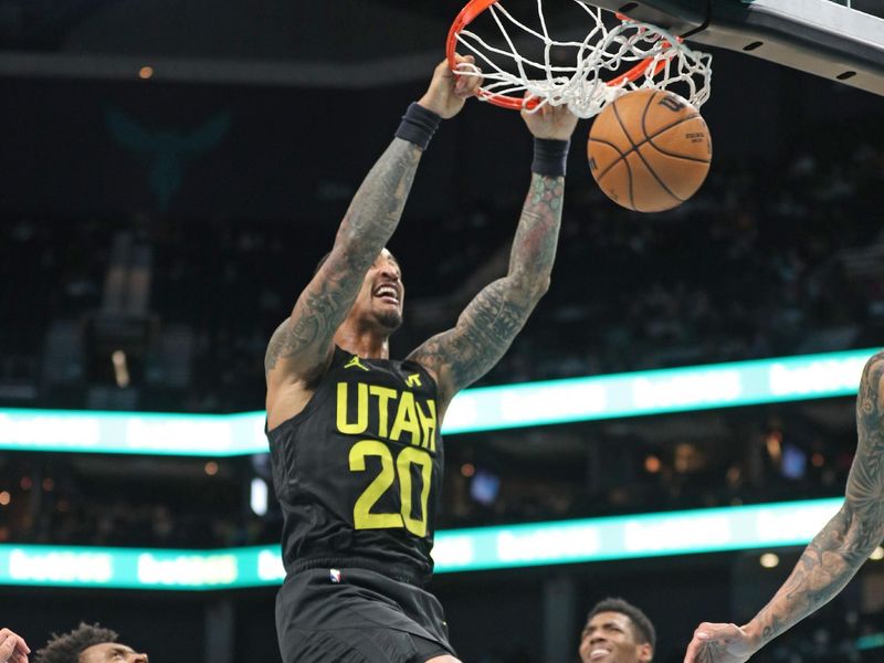 CHARLOTTE, NC - JANUARY 27: John Collins #20 of the Utah Jazz dunks the ball during the game against the Charlotte Hornets on January 27, 2024 at Spectrum Center in Charlotte, North Carolina. NOTE TO USER: User expressly acknowledges and agrees that, by downloading and or using this photograph, User is consenting to the terms and conditions of the Getty Images License Agreement.  Mandatory Copyright Notice:  Copyright 2024 NBAE (Photo by Brock Williams-Smith/NBAE via Getty Images)