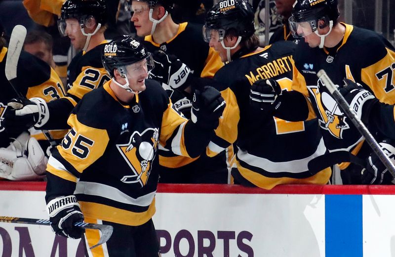 Oct 4, 2024; Pittsburgh, Pennsylvania, USA;  Pittsburgh Penguins center Noel Acciari (55) celebrates with the Pittsburgh Penguins bench after scoring a goal against the Columbus Blue Jackets during the second period at PPG Paints Arena. Mandatory Credit: Charles LeClaire-Imagn Images