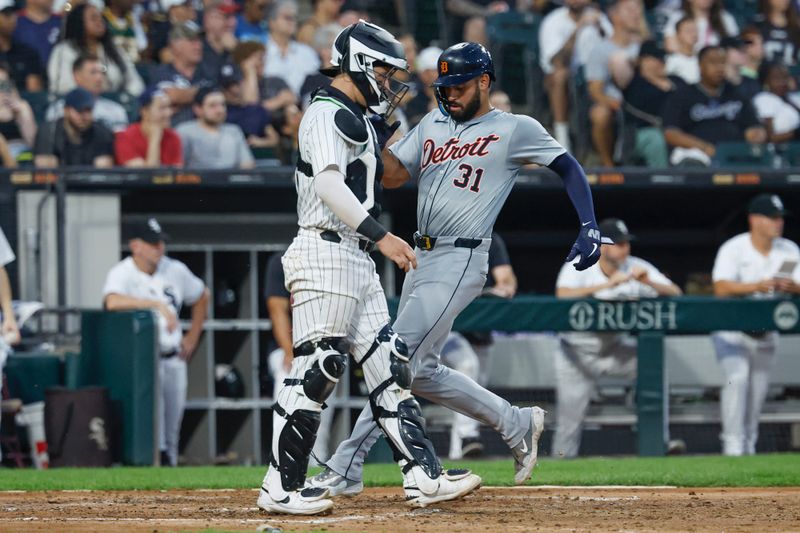 Aug 24, 2024; Chicago, Illinois, USA; Detroit Tigers outfielder Riley Greene (31) scores against the Chicago White Sox during the fourth inning at Guaranteed Rate Field. Mandatory Credit: Kamil Krzaczynski-USA TODAY Sports