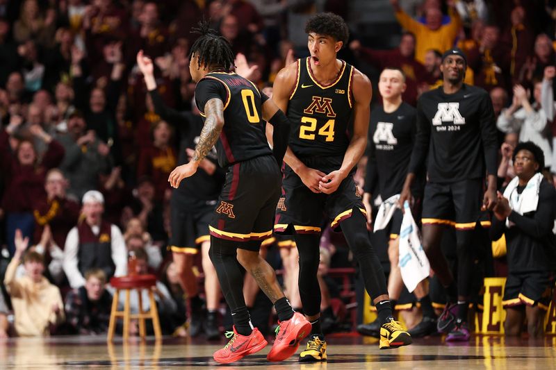 Feb 6, 2024; Minneapolis, Minnesota, USA; Minnesota Golden Gophers guard Cam Christie (24) celebrates his three-point basket against Michigan State during the second half at Williams Arena. Mandatory Credit: Matt Krohn-USA TODAY Sports