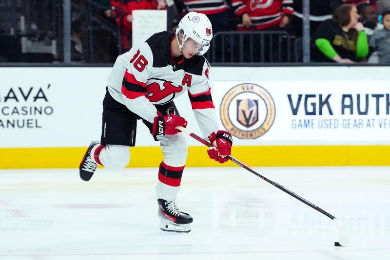 Mar 17, 2024; Las Vegas, Nevada, USA; New Jersey Devils center Jack Hughes (86) warms up before a game against the Vegas Golden Knights at T-Mobile Arena. Mandatory Credit: Stephen R. Sylvanie-USA TODAY Sports