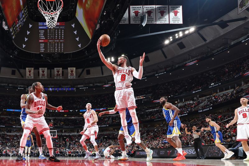 CHICAGO, IL - JANUARY 12: Zach LaVine #8 of the Chicago Bulls rebounds during the game against the Golden State Warriors on January 12, 2024 at United Center in Chicago, Illinois. NOTE TO USER: User expressly acknowledges and agrees that, by downloading and or using this photograph, User is consenting to the terms and conditions of the Getty Images License Agreement. Mandatory Copyright Notice: Copyright 2024 NBAE (Photo by Jeff Haynes/NBAE via Getty Images)