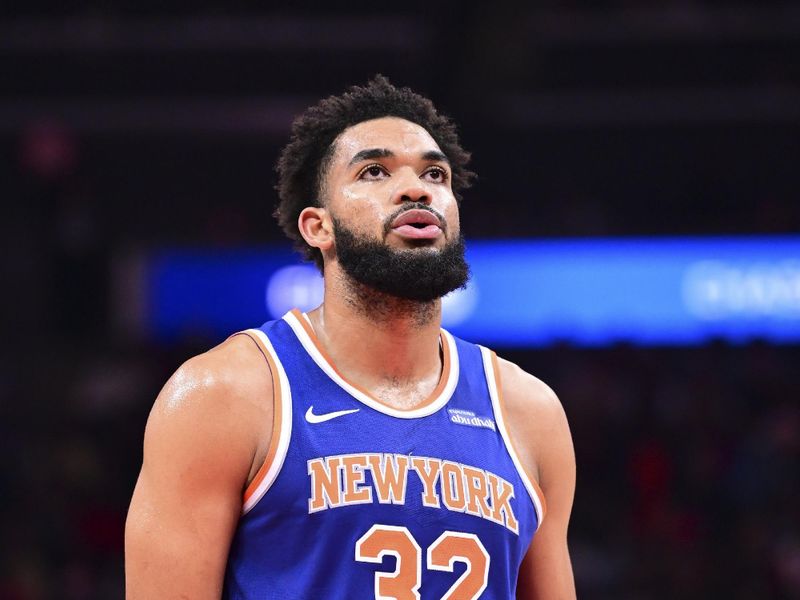 ATLANTA, GA - November 6:  Karl-Anthony Towns #32 of the New York Knicks shoots a free throw during the game against the Atlanta Hawks on November 6, 2024 at State Farm Arena in Atlanta, Georgia.  NOTE TO USER: User expressly acknowledges and agrees that, by downloading and/or using this Photograph, user is consenting to the terms and conditions of the Getty Images License Agreement. Mandatory Copyright Notice: Copyright 2024 NBAE (Photo by Adam Hagy/NBAE via Getty Images)