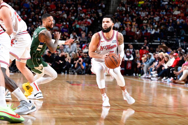 HOUSTON, TX - JANUARY 6: Fred VanVleet #5 of the Houston Rockets handles the ball during the game against the Milwaukee Bucks on January 6, 2024 at the Toyota Center in Houston, Texas. NOTE TO USER: User expressly acknowledges and agrees that, by downloading and or using this photograph, User is consenting to the terms and conditions of the Getty Images License Agreement. Mandatory Copyright Notice: Copyright 2024 NBAE (Photo by Logan Riely/NBAE via Getty Images)