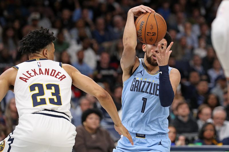 MEMPHIS, TENNESSEE - NOVEMBER 19: Scotty Pippen Jr. #1 of the Memphis Grizzlies goes to the basket against Trey Alexander #23 of the Denver Nuggets during the second half of an Emirates NBA Cup game at FedExForum on November 19, 2024 in Memphis, Tennessee. NOTE TO USER: User expressly acknowledges and agrees that, by downloading and or using this photograph, User is consenting to the terms and conditions of the Getty Images License Agreement. (Photo by Justin Ford/Getty Images)