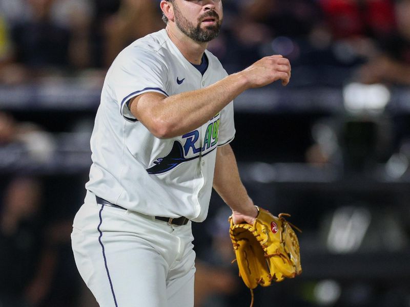 Sep 20, 2025; Tampa, Florida, USA; Tampa Bay Rays pitcher Jesse Scholtens (65) reacts after a pitch against the Boston Red Sox in the seventh inning at George M. Steinbrenner Field. Mandatory Credit: Nathan Ray Seebeck-Imagn Images