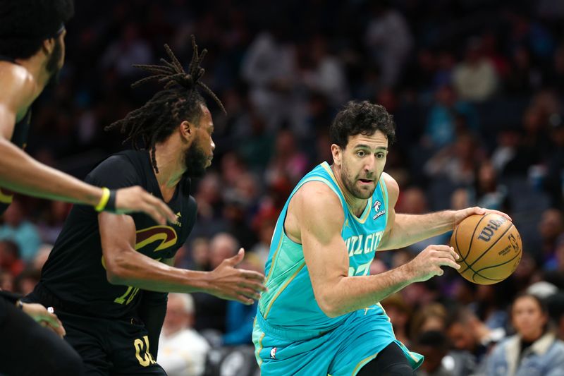 CHARLOTTE, NORTH CAROLINA - MARCH 27: Vasilije Micic #22 of the Charlotte Hornets drives to the basket during the first half of the game against the Cleveland Cavaliers at Spectrum Center on March 27, 2024 in Charlotte, North Carolina. NOTE TO USER: User expressly acknowledges and agrees that, by downloading and or using this photograph, User is consenting to the terms and conditions of the Getty Images License Agreement. (Photo by Jared C. Tilton/Getty Images)