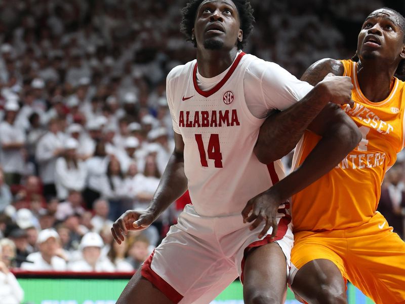Jan 24, 2026; Tuscaloosa, Alabama, USA; Alabama Crimson Tide center Charles Bediako (14) jockeys for position against Tennessee Volunteers forward Felix Okpara (34) during the first half at Coleman Coliseum. Mandatory Credit: David Leong-Imagn Images