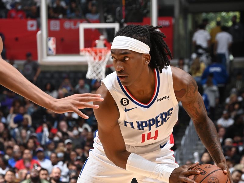 LOS ANGELES, CA - OCTOBER 30: Terance Mann #14 of the LA Clippers dribbles the ball during the game against the New Orleans Pelicans on October 30, 2022 at Crypto.Com Arena in Los Angeles, California. NOTE TO USER: User expressly acknowledges and agrees that, by downloading and/or using this Photograph, user is consenting to the terms and conditions of the Getty Images License Agreement. Mandatory Copyright Notice: Copyright 2022 NBAE (Photo by Andrew D. Bernstein/NBAE via Getty Images)