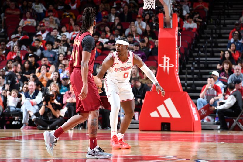 HOUSTON, TX - MARCH 16: Aaron Holiday #0 of the Houston Rockets plays defense during the game against the Cleveland Cavaliers  on March 16, 2023 at the Toyota Center in Houston, Texas. NOTE TO USER: User expressly acknowledges and agrees that, by downloading and or using this photograph, User is consenting to the terms and conditions of the Getty Images License Agreement. Mandatory Copyright Notice: Copyright 2024 NBAE (Photo by Logan Riely/NBAE via Getty Images)