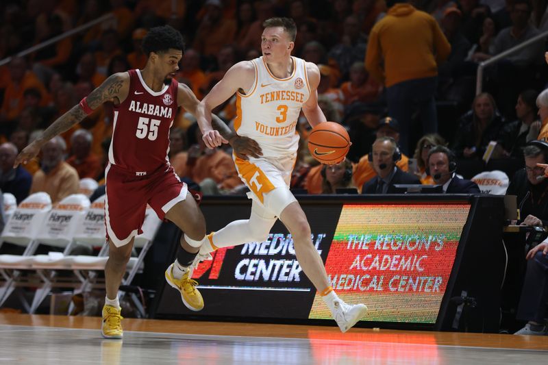 Jan 20, 2024; Knoxville, Tennessee, USA; Tennessee Volunteers guard Dalton Knecht (3) brings the ball up court against Alabama Crimson Tide guard Aaron Estrada (55) during the second half at Thompson-Boling Arena at Food City Center. Mandatory Credit: Randy Sartin-USA TODAY Sports