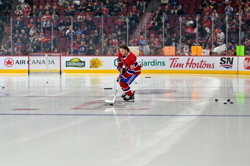 Jan 13, 2024; Montreal, Quebec, CAN; Montreal Canadiens forward Joshua Roy (89) takes a rookie solo lap during the warmup period before the game against the Edmonton Oilers at the Bell Centre. Mandatory Credit: Eric Bolte-USA TODAY Sports