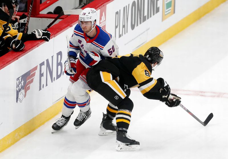 Mar 16, 2024; Pittsburgh, Pennsylvania, USA;  Pittsburgh Penguins left wing Michael Bunting (8) hip checks New York Rangers left wing Will Cuylle (50) during the third period at PPG Paints Arena. New York won 7-4.  Mandatory Credit: Charles LeClaire-USA TODAY Sports